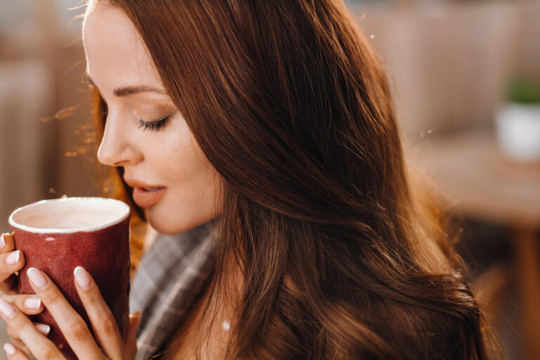 a girl drinks coffee in a coffee shop beautiful h 2023 11 27 05 08 37 utc